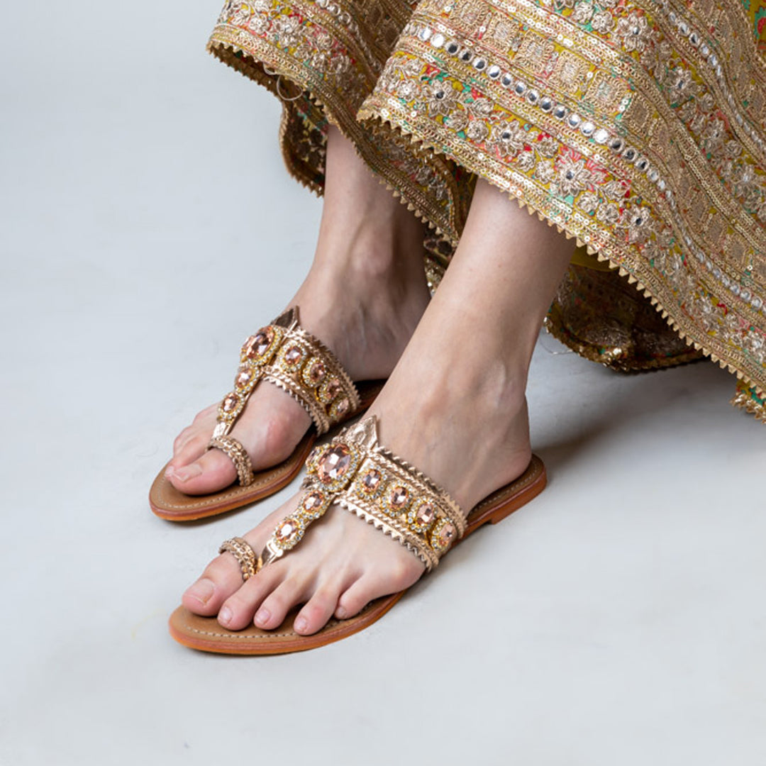CRYSTA RAIN-Embellished Flats in-Rose Gold.