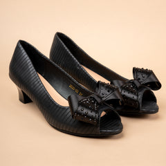 Velour Bow Kitten Heels in cream white and black.