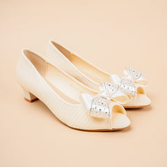 Velour Bow Kitten Heels in cream white and black.
